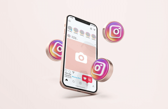 a phone with Instagram app showing video ads